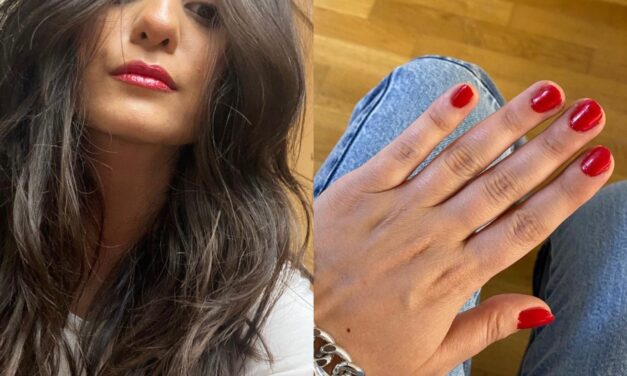 Fringe Bangs and Red Nails